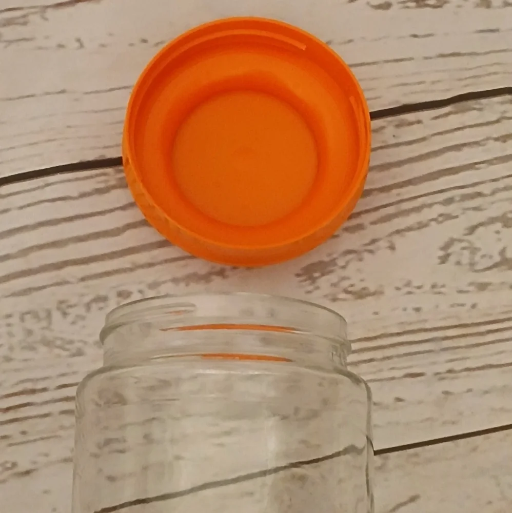 Vintage 1970s Glass Tang Jar with Orange Lid Wheel